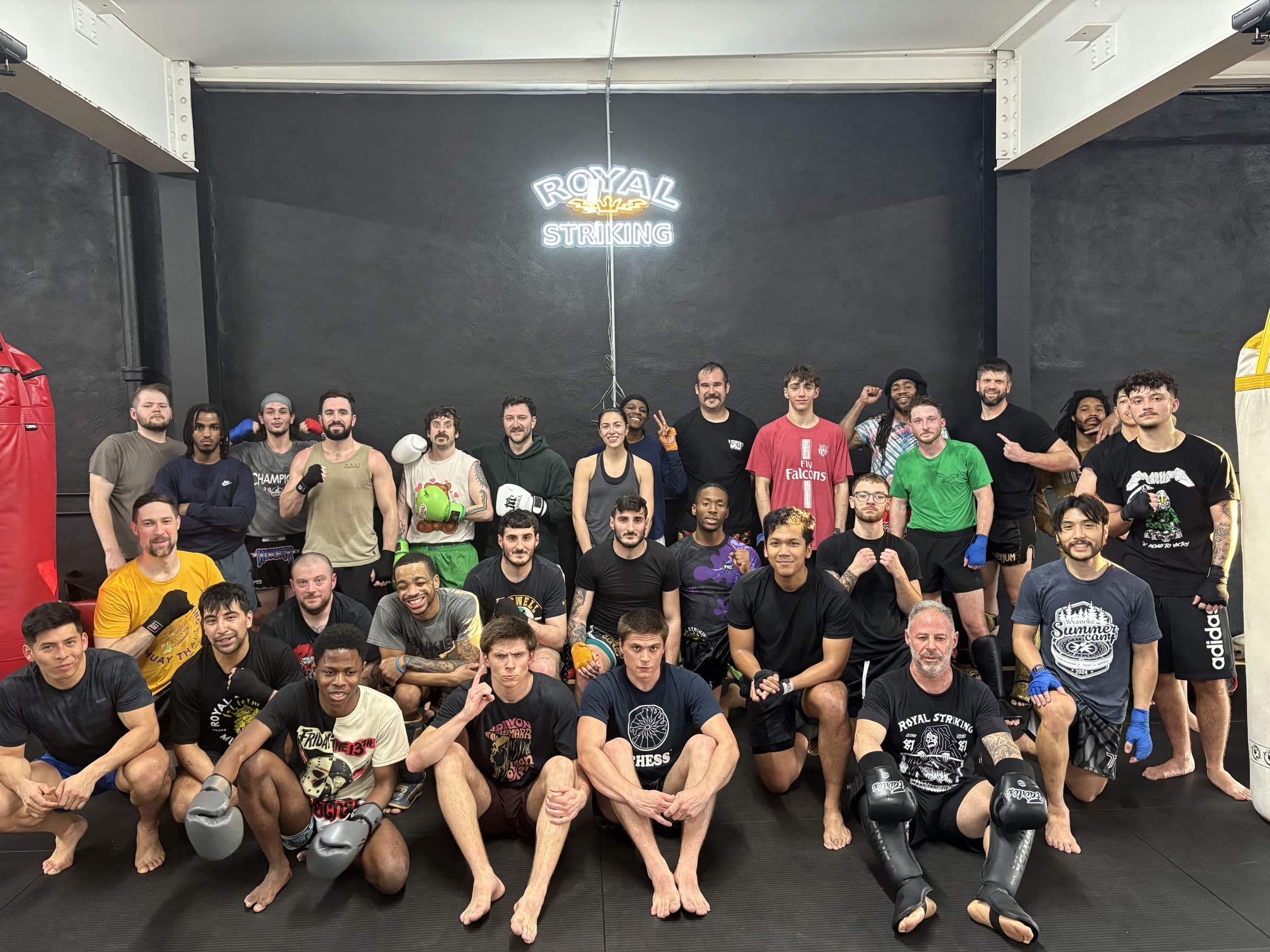 Group photo of members and coaches after class